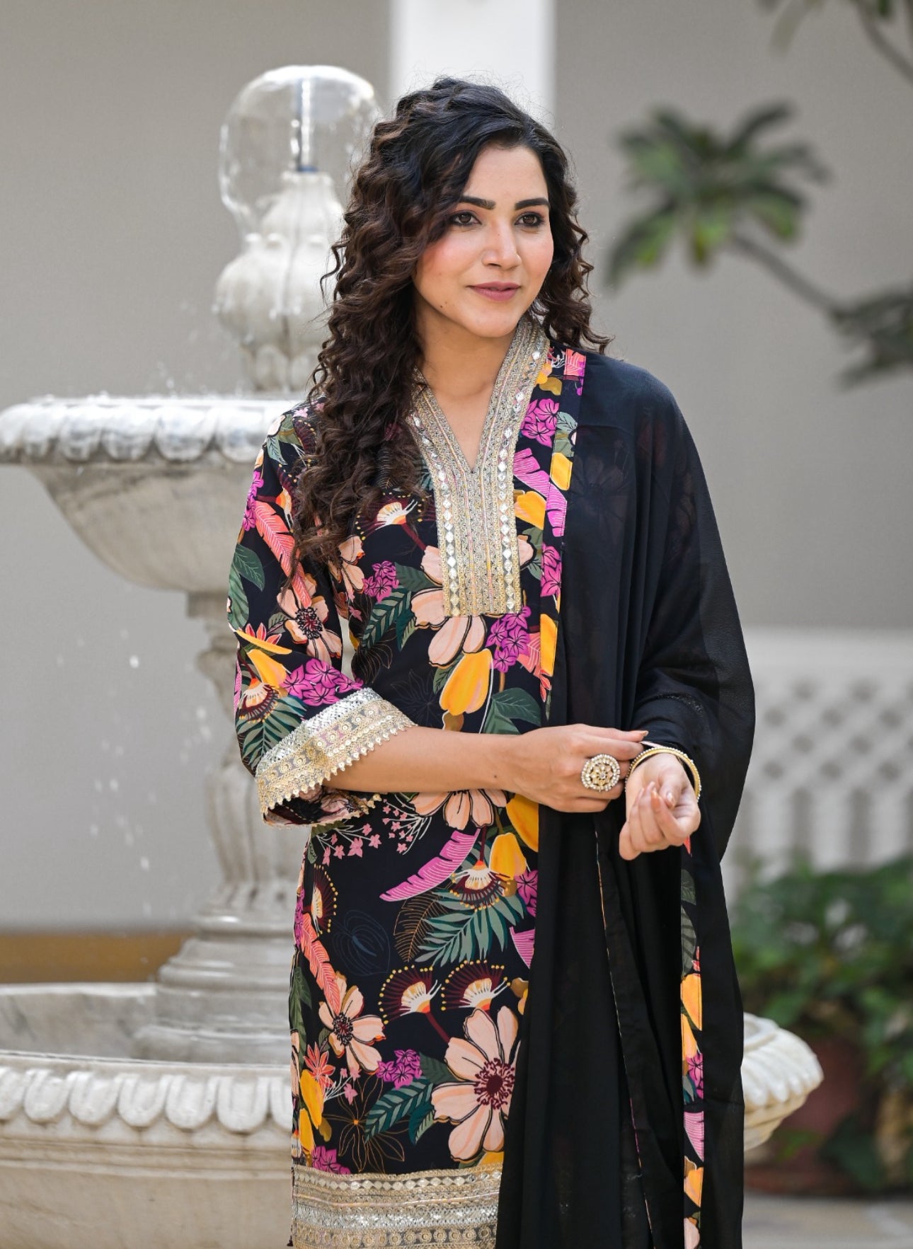 Designer stitched suit with Tulip Pants in all Black colour