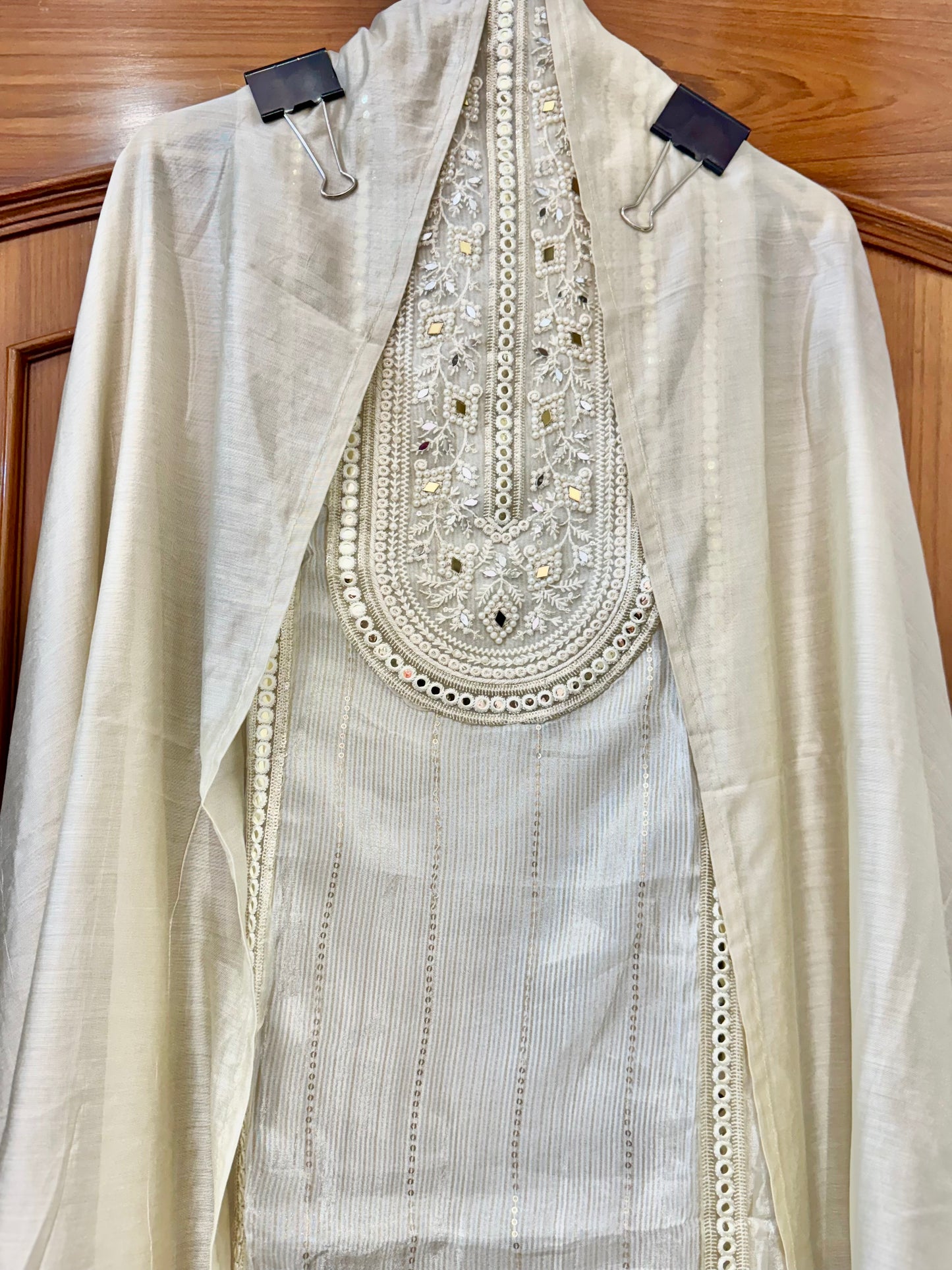 Pure shimmer suit with Pearl work detailing on neck